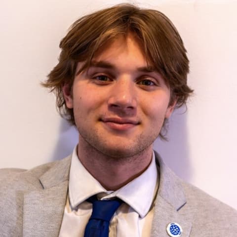 Headshot of Alex Green, Head of Events of the Claude Builders Club at Northeastern University.